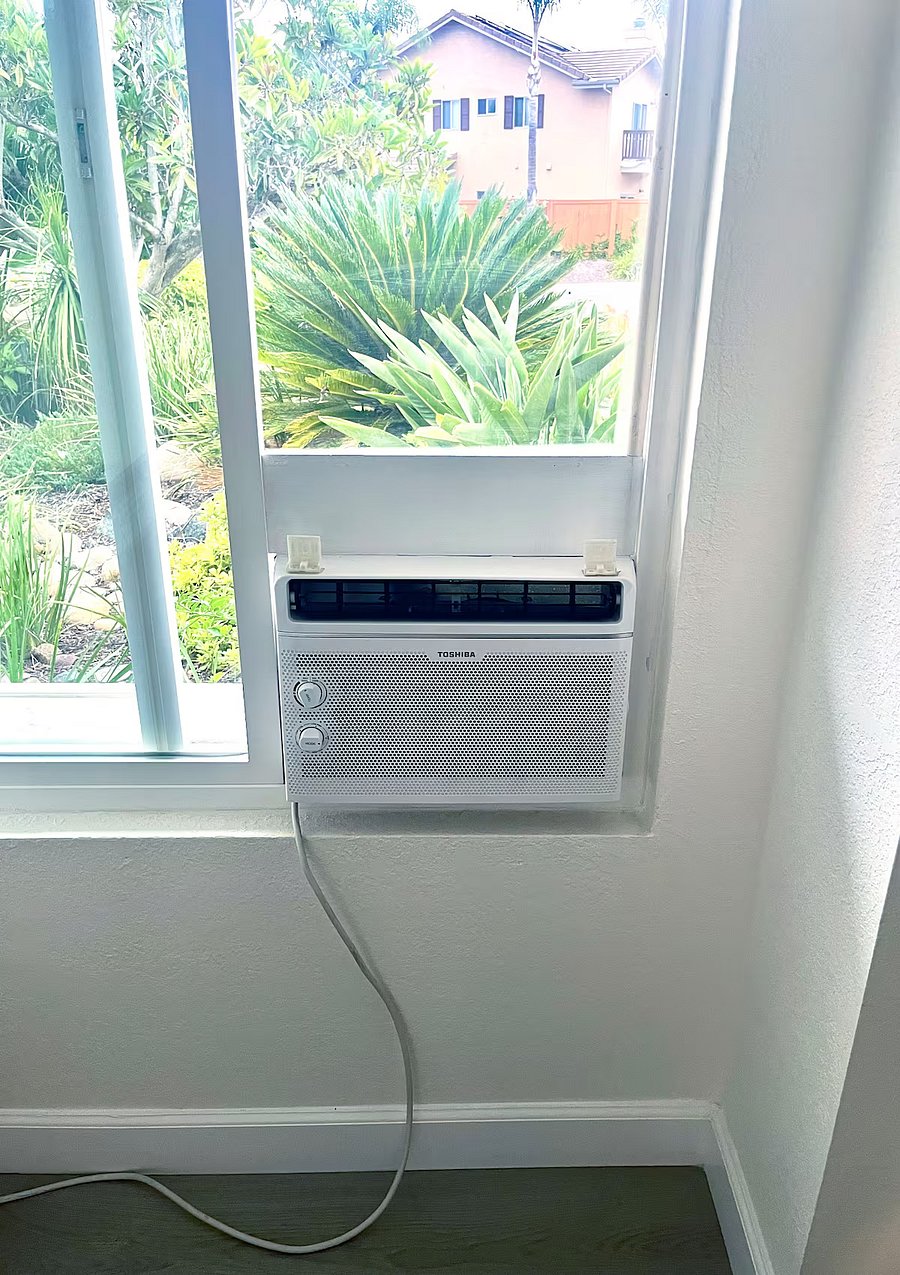 An air conditioner unit cools the entire guesthouse during the warmer months.