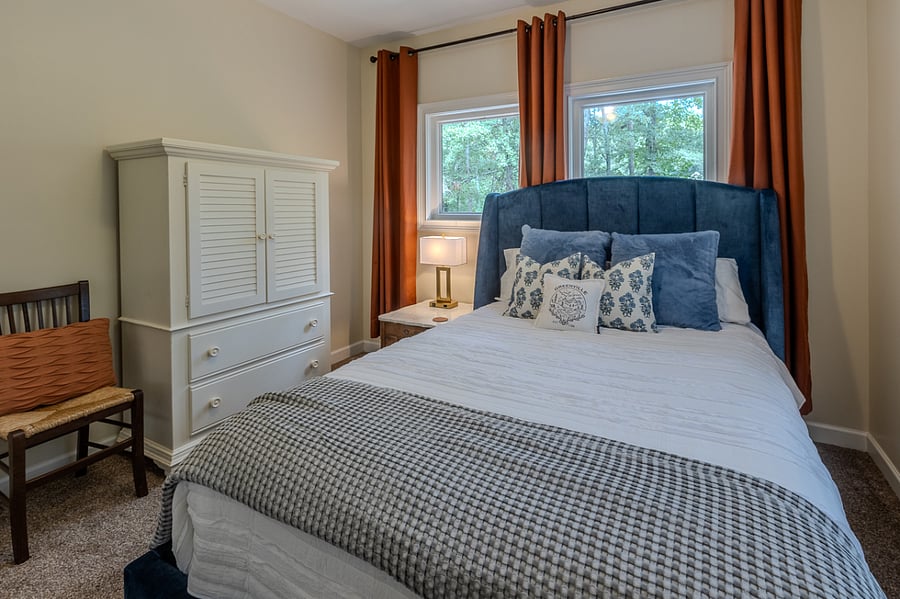 Alternate view of 1st bedroom. Dresser w/3 shelves inside and 2 pull out drawers at bottom. Store bed pillows on top of dresser. Touch lamp w/charging outlets on night stand.