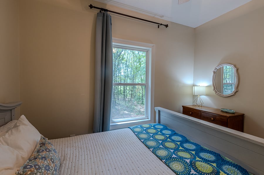 Nice size dresser. Window views back yard. Black out curtain. Chair to be added by dresser.