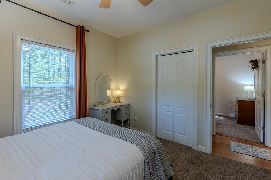 Nice size closet. 2 levels for hanging clothes and 2 shelves. High ceiling allows extra storage on top shelf.