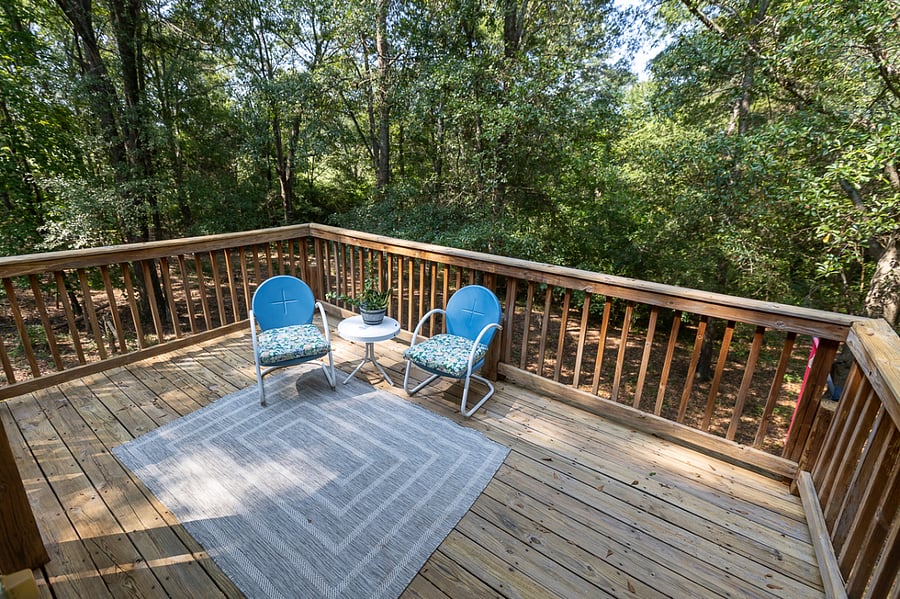 Upstairs balcony. Ducane gas grill to be added. Umbrella to be added. Beautiful view of trees and pasture beyond.