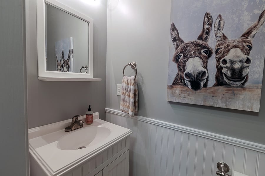 Half bath downstairs past laundry area.