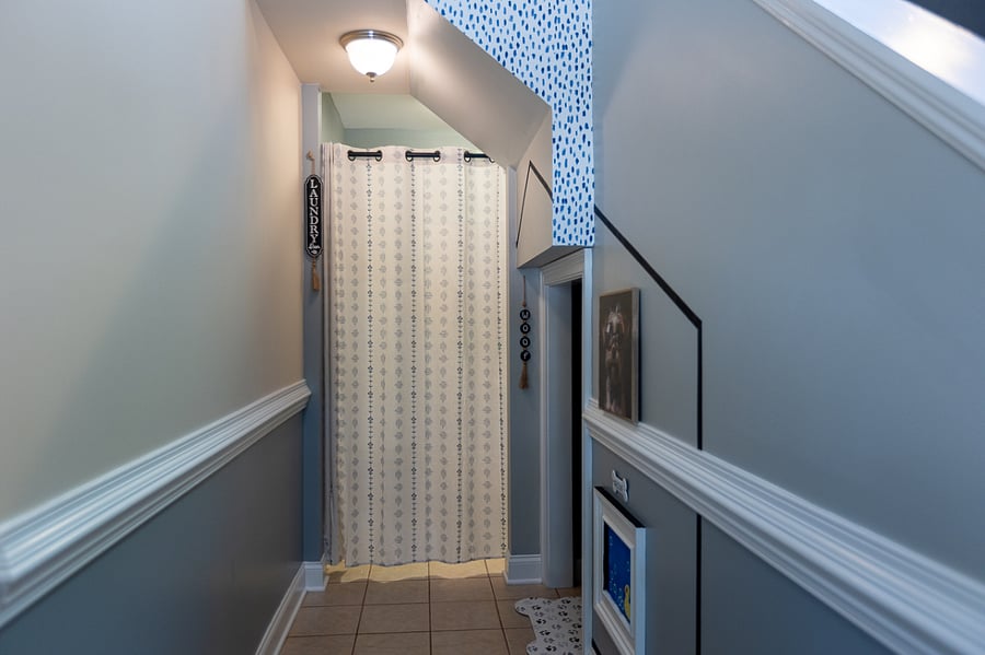 Curtain closure for laundry area.