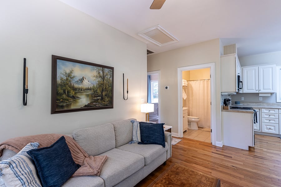 View of full bathroom entrance from living room.
