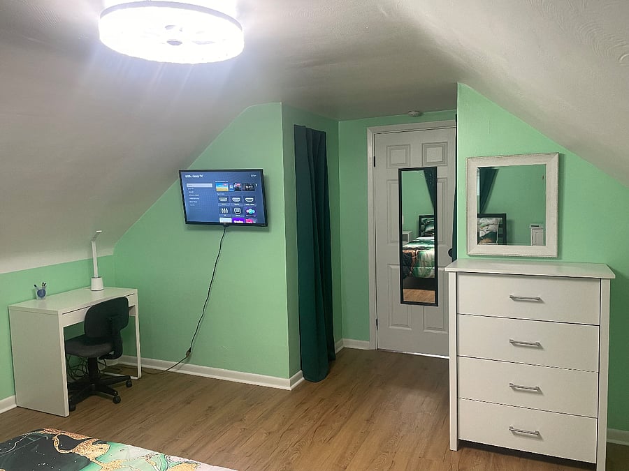 Smart TV, workstation, storage (a dresser and 2 built-in closets), vanity mirror and full-length mirror