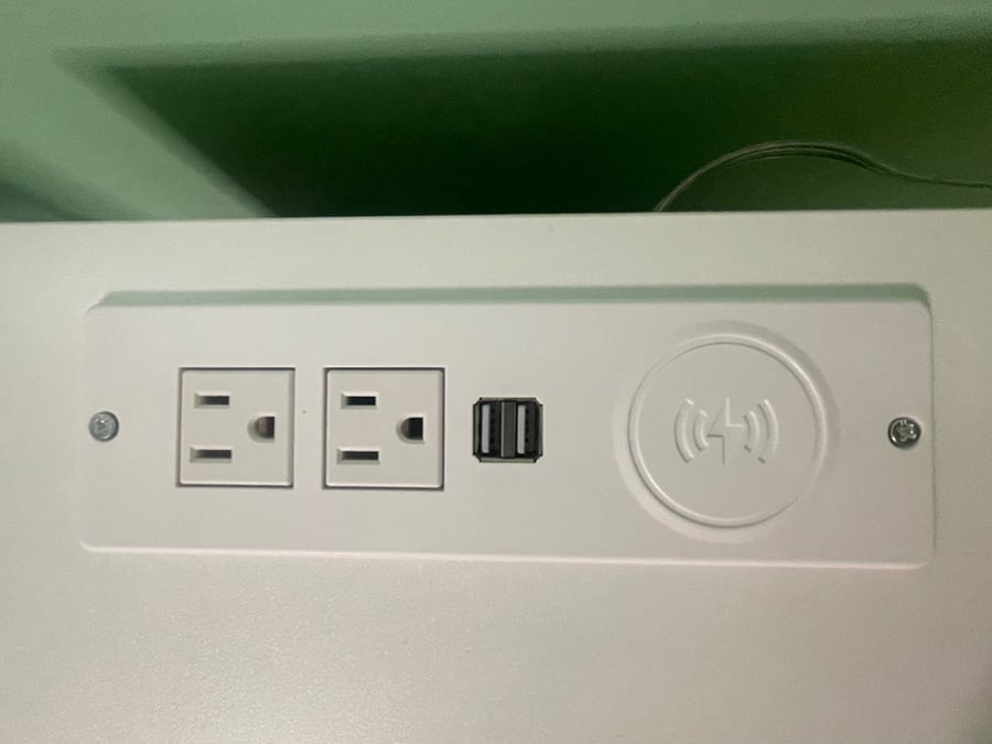 Charging stating on top of the nightstand