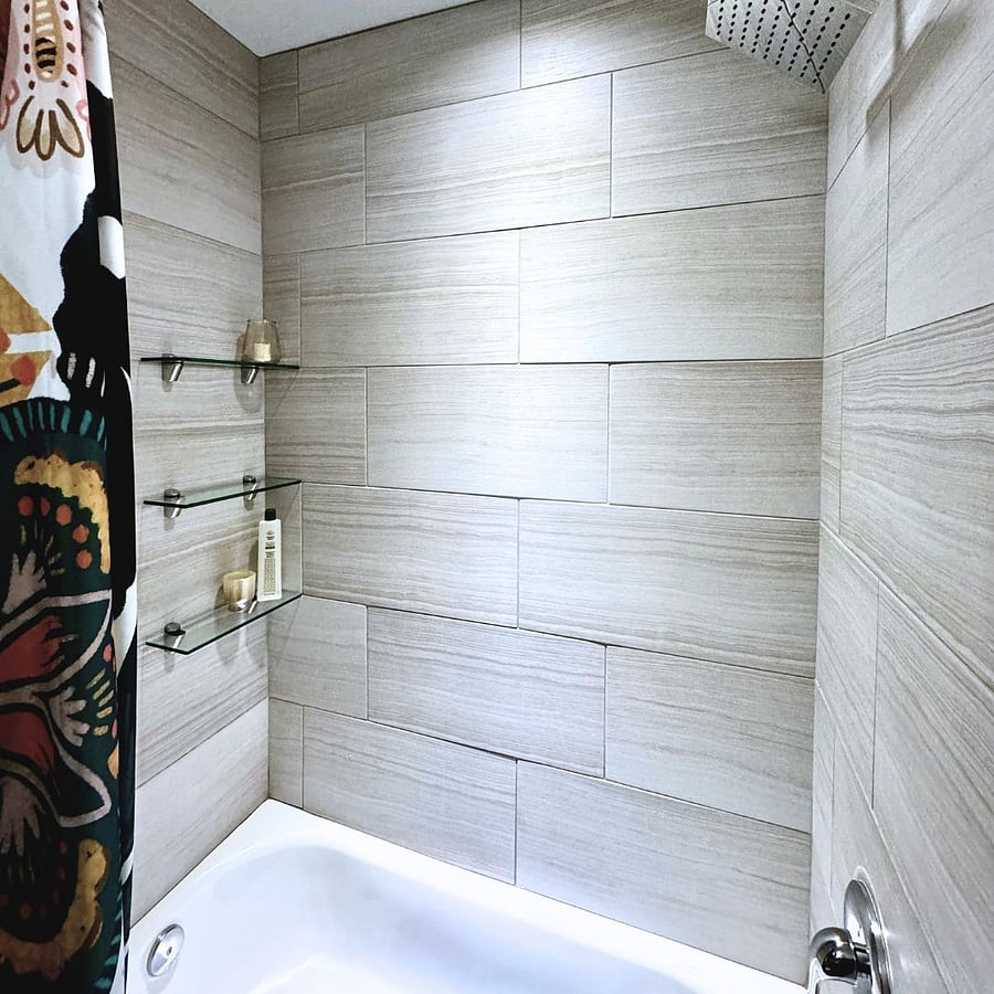 The beautiful tile shower & bath has a rain-style shower-head and a bathtub for your use. It's modest in size, but just turn on a few battery operated candles and you'll lose yourself. 