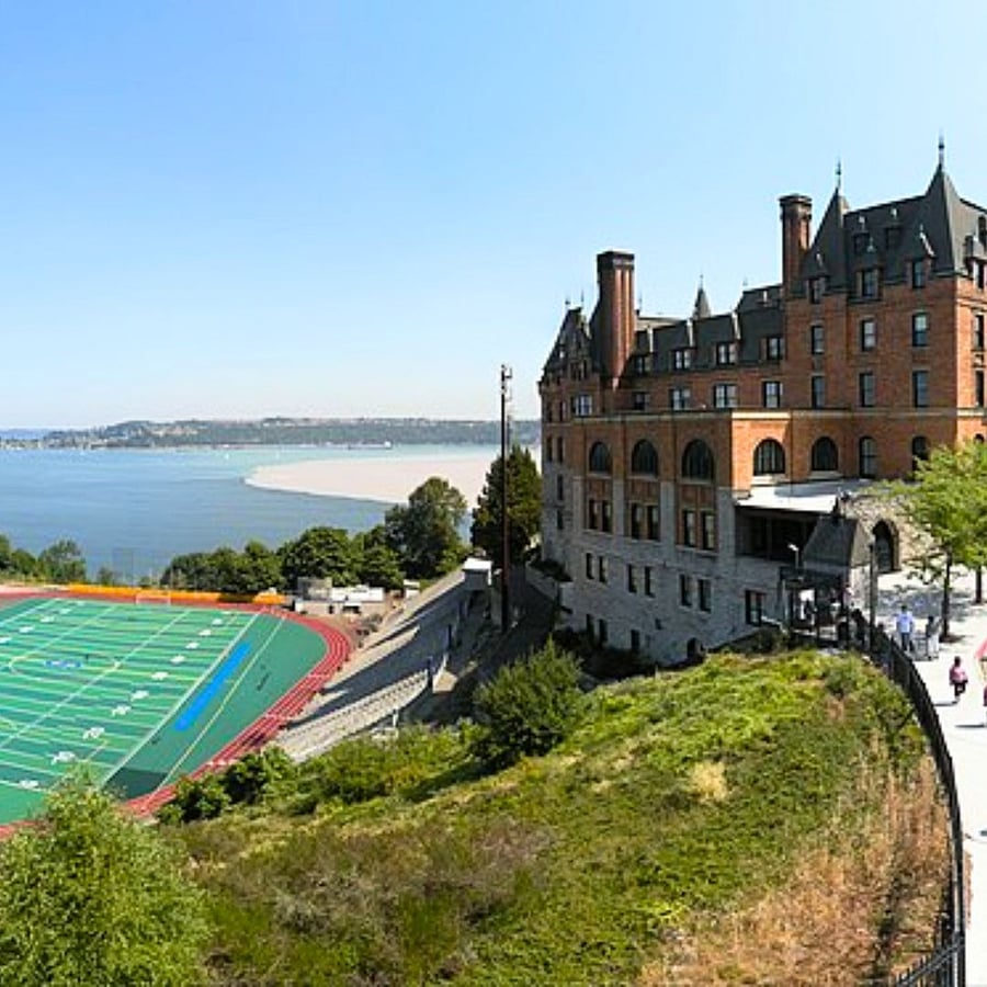 Stadium High School in downtown Tacoma WA is not only an iconic castle-style landmark featured in the cult movie "10 Things I Hate About You," its also a top fitness destination. Nestled in the heart of Tacomas medical and hospital district, the schools legendary bowl steps attract travel nurses, contractors, and professionals staying in short-term furnished rentals who want a challenging outdoor workout. Running the bowl steps is a local tradition and a great way to meet fellow fitness enthusiasts through groups like Tacoma Runners or The Drop Pickleball Club. With sweeping views of Commencement Bay and quick access to nearby hospitals, Stadium High School combines history, fitness, and community all in one epic location.
