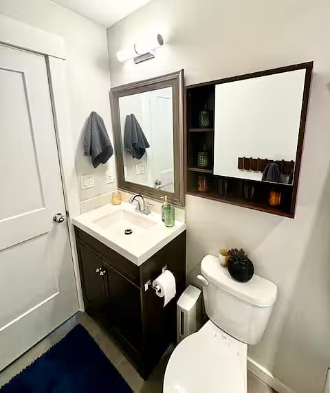 Your own private bathroom is situated directly across from your room. In addition to the new vanity, you'll have plenty of storage, organizers, and hangers for your items - including a hook for a robe, if that's your thing. 