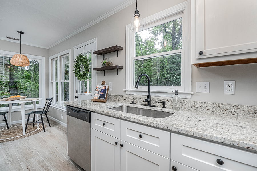 Eat-in Kitchen overlooking deck and backyard