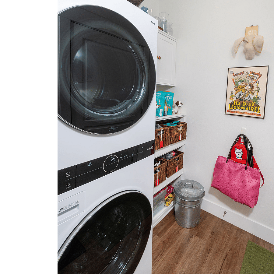 Laundry Room has Stacked Washer & Dryer