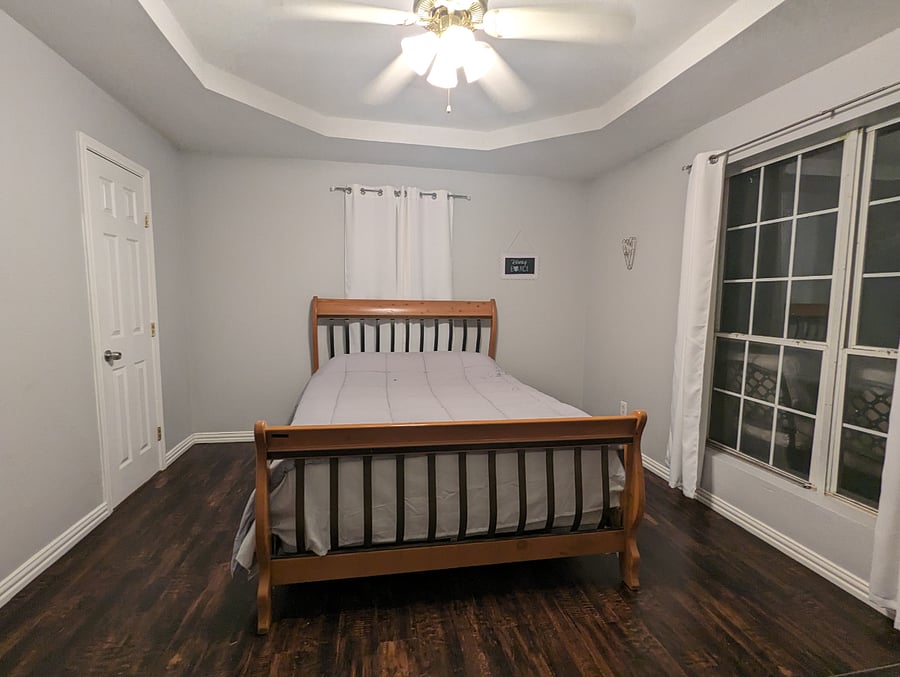 Bedroom #2 is upstairs facing the balcony and the front of the property.