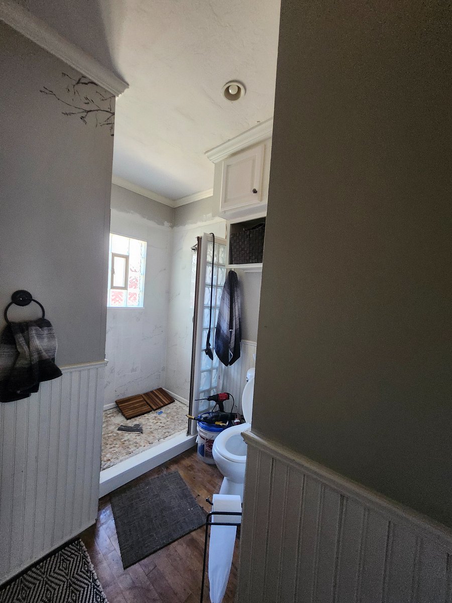 Downstairs bathroom...floor of shower in remodel