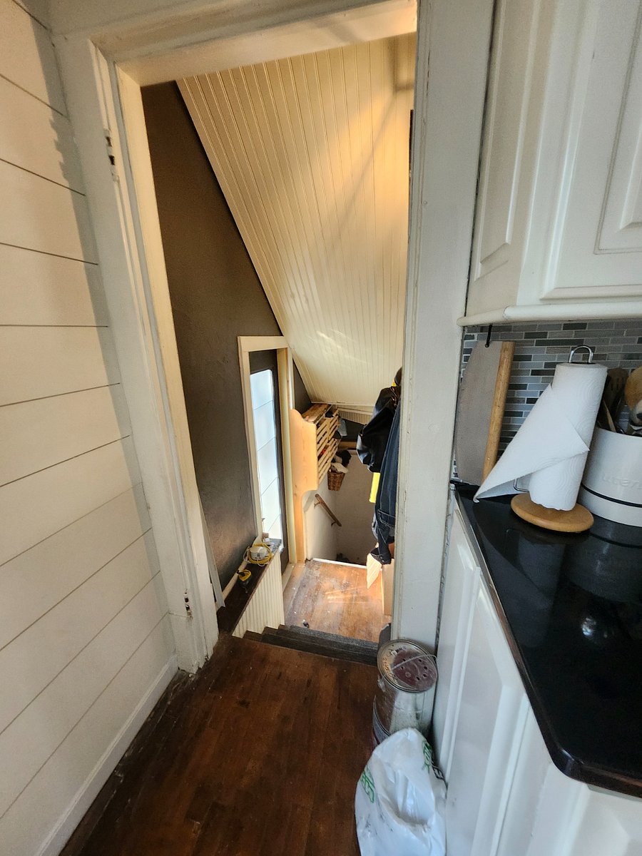 Down to basement with jacket hat storage on the way
