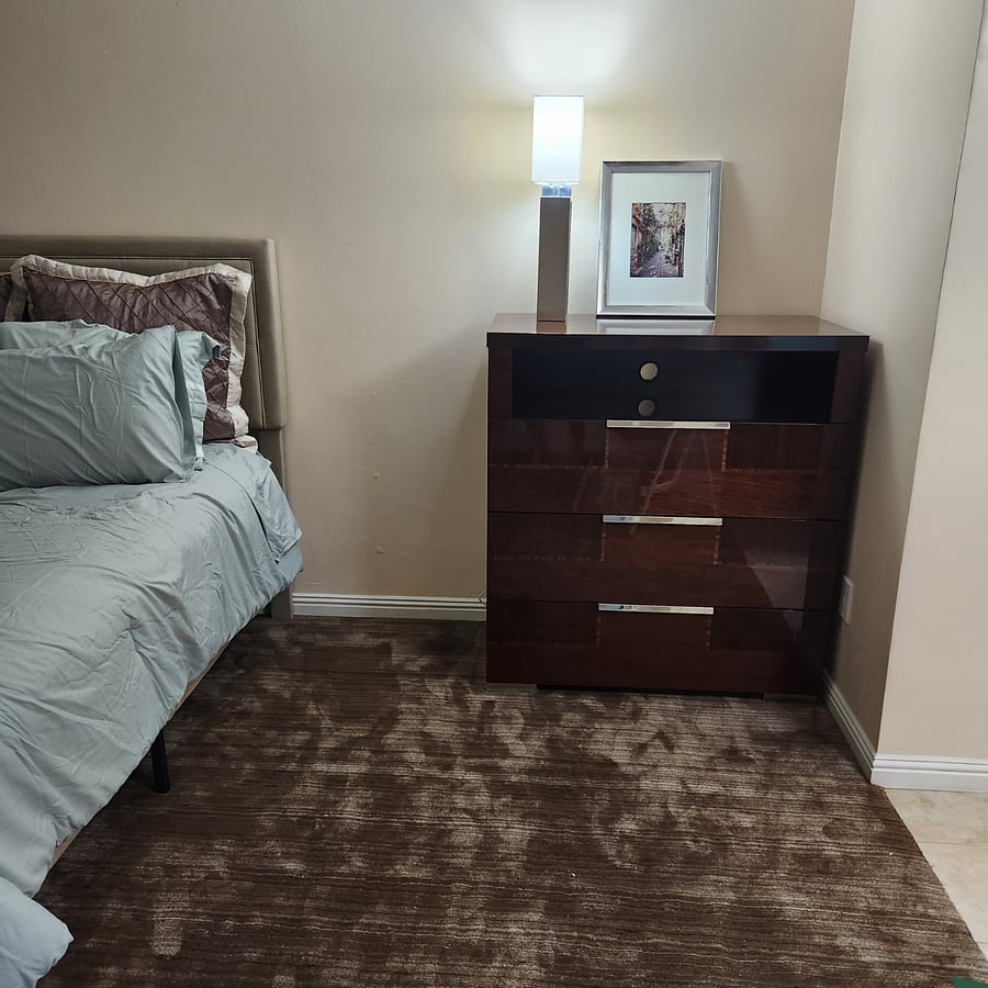 primary bedroom queen sized bed