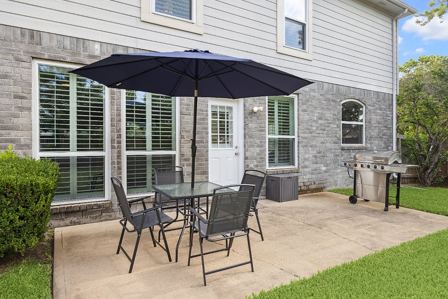 Enjoy conversation at the outside patio table