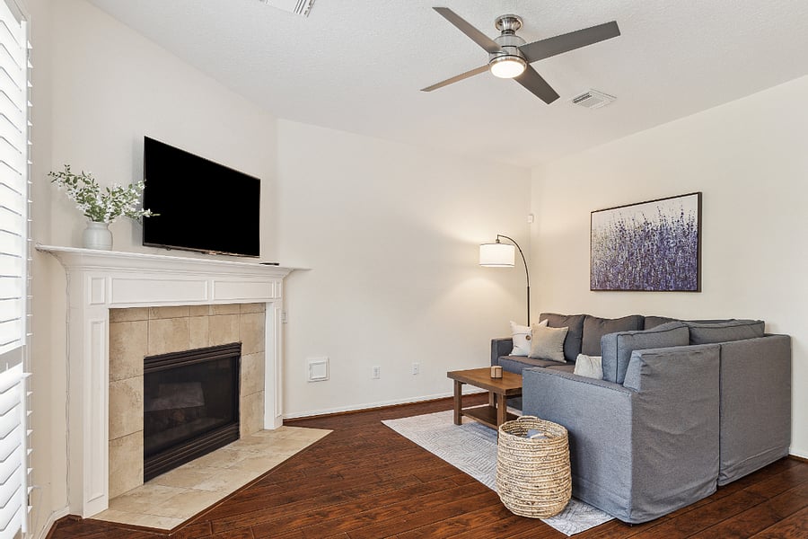 Sit back in the cozy den with fireplace
