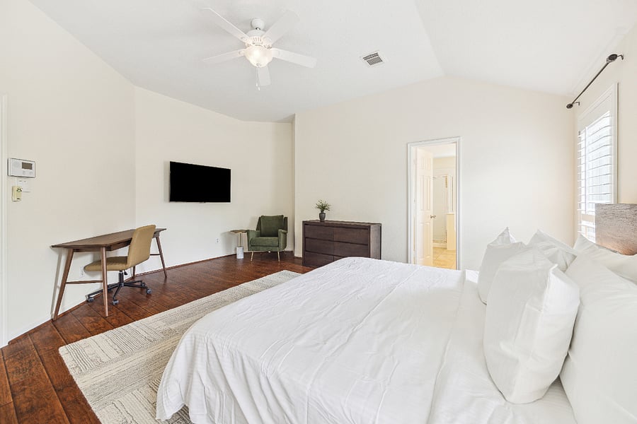 Read a book, watch a show, or get some work done in the comfort of your master bedroom