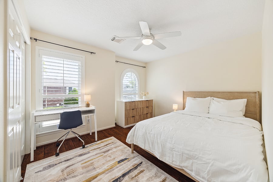 Beautiful queen bedroom with desk and working space