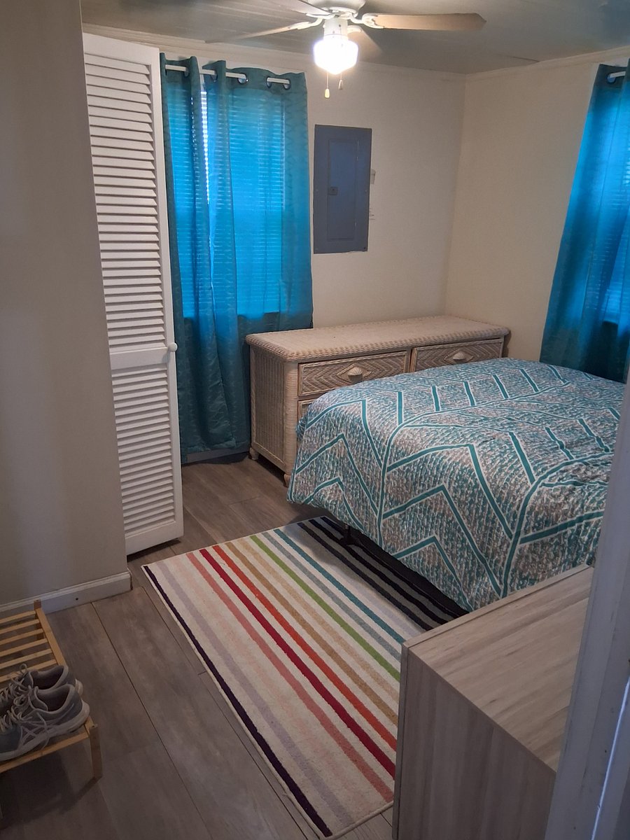 Bedroom w dresser and closet storage