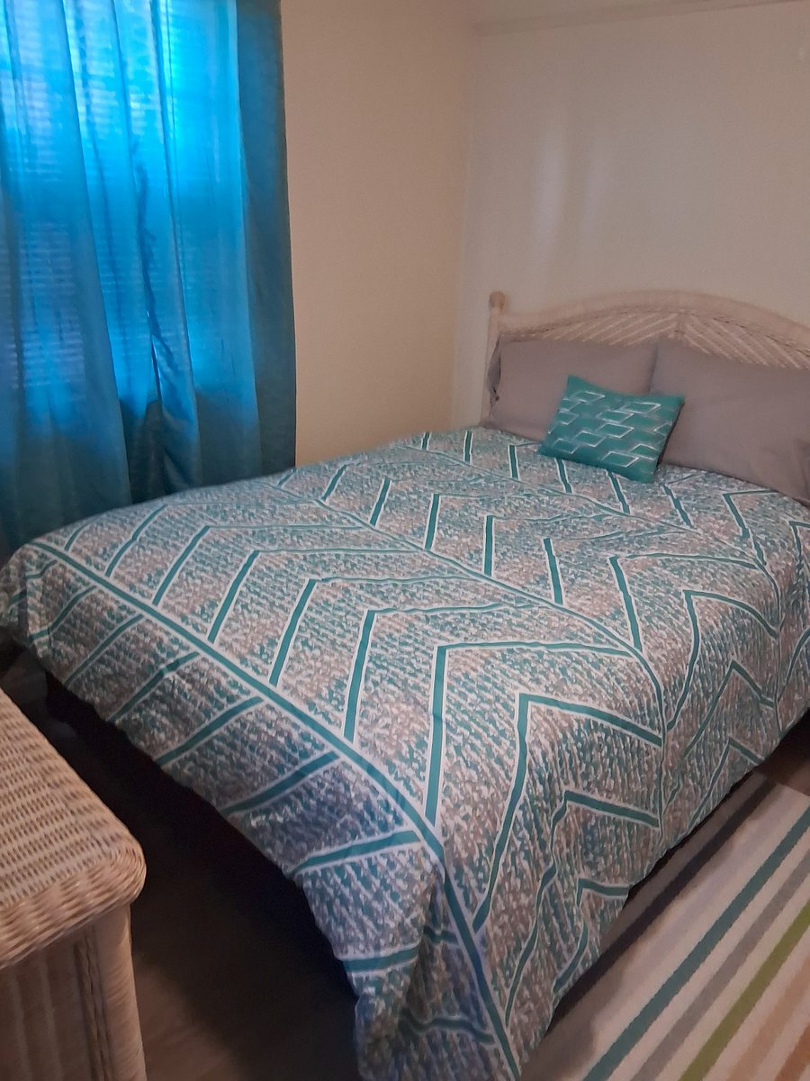 Full size bed with linen