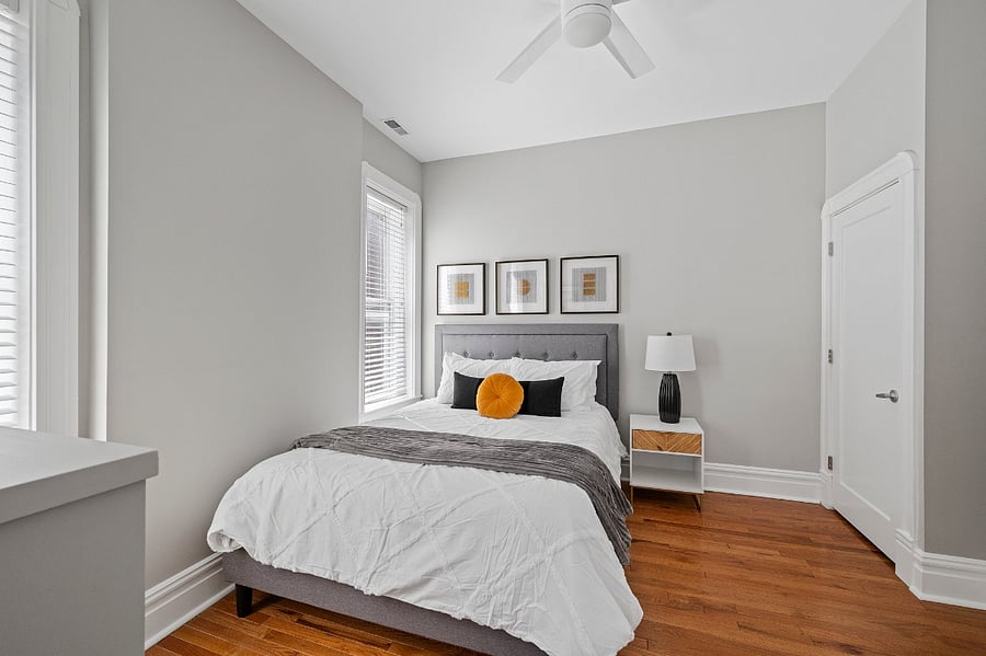 Queen bed. Ceiling Fan. Hardwood floor.