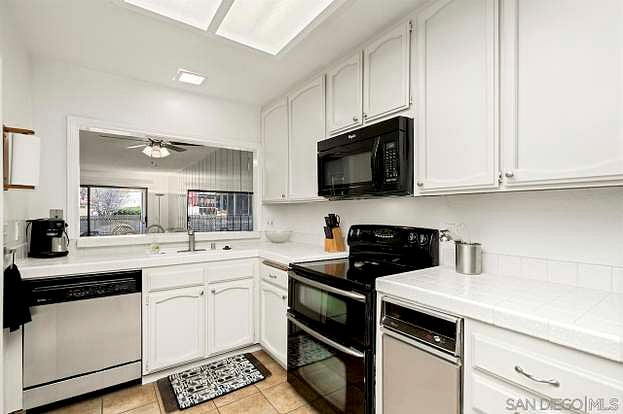 Kitchen has dishwasher, refrigerator, oven, microwave 