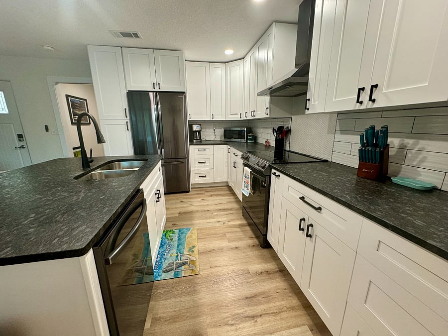 Renovated Kitchen with Leather Granite Countertops & Stainless Steel Appliances