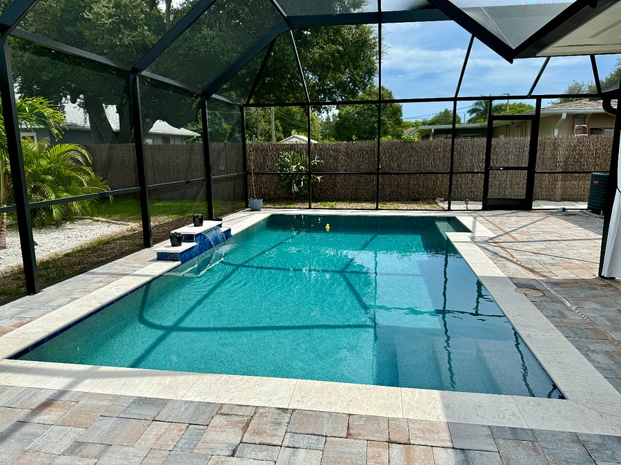 Screened Custom Pool with Water Feature