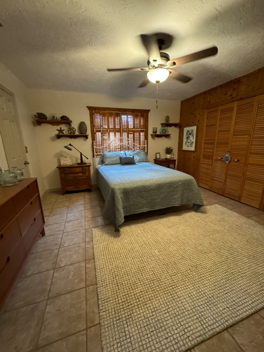 Primary bedroom with access to outside sleeping area