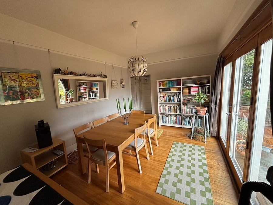 Dining room with glass doors to deck