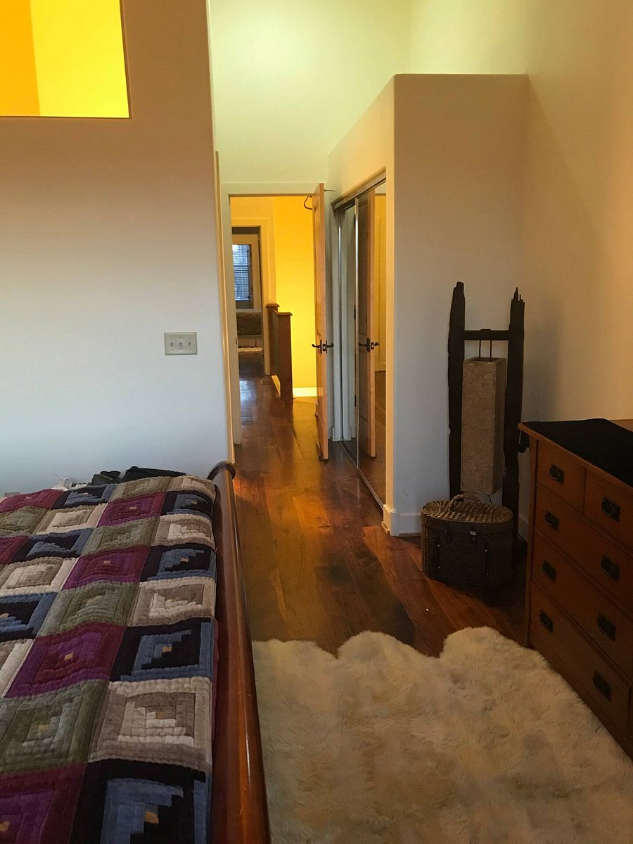 Larger bedroom looking out to landing