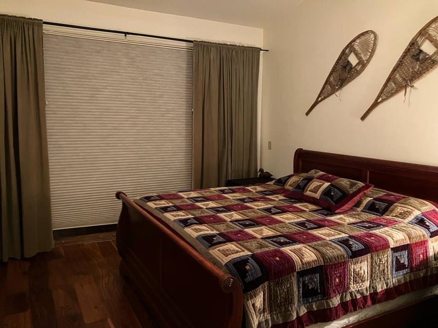Larger bedroom with King size bed
