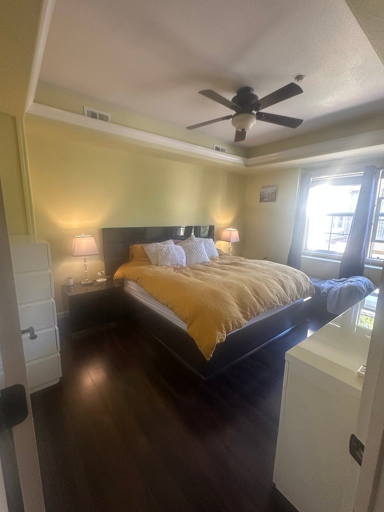 Master bedroom with two dressers