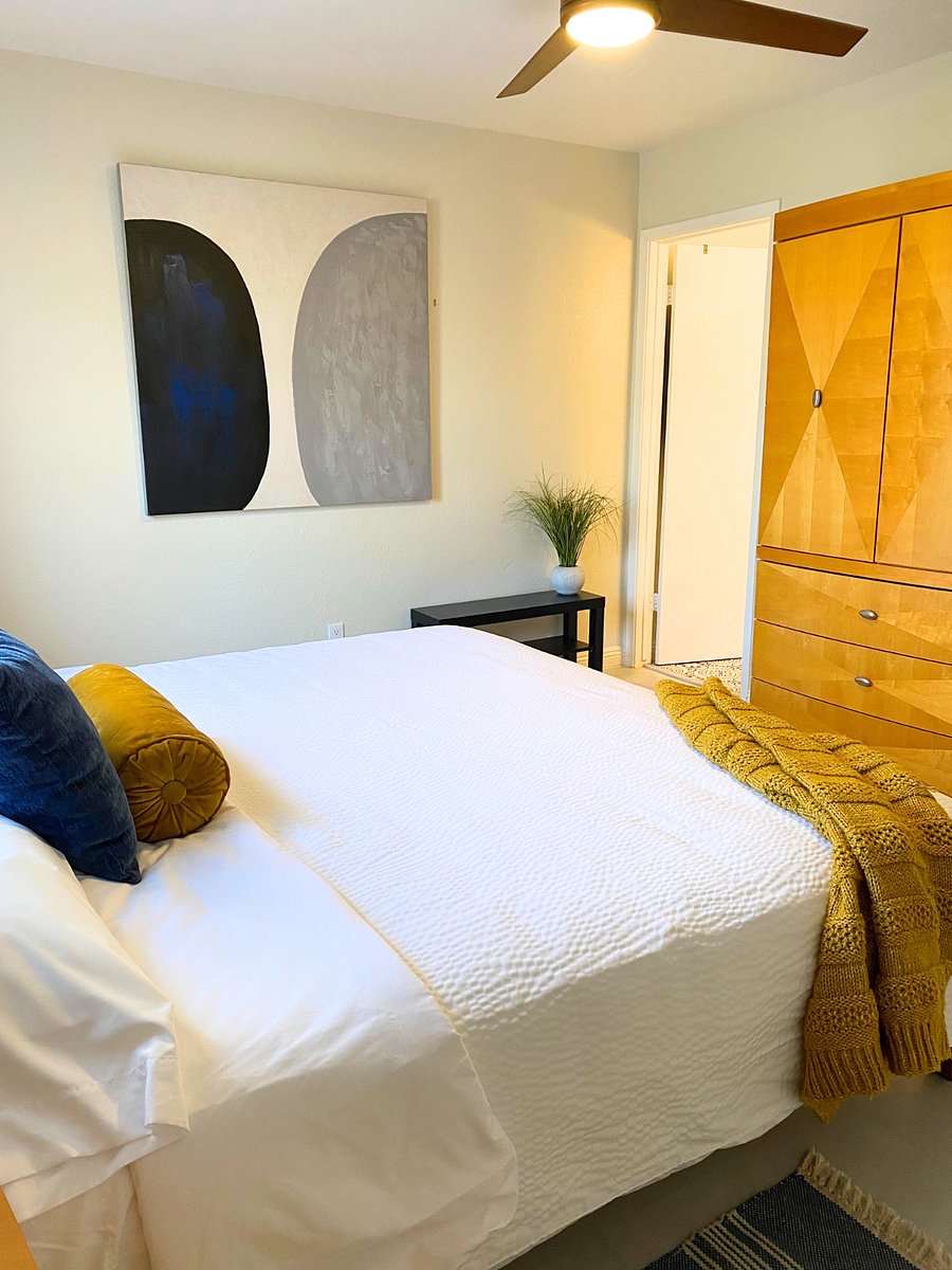 Spacious master bedroom with king size bed