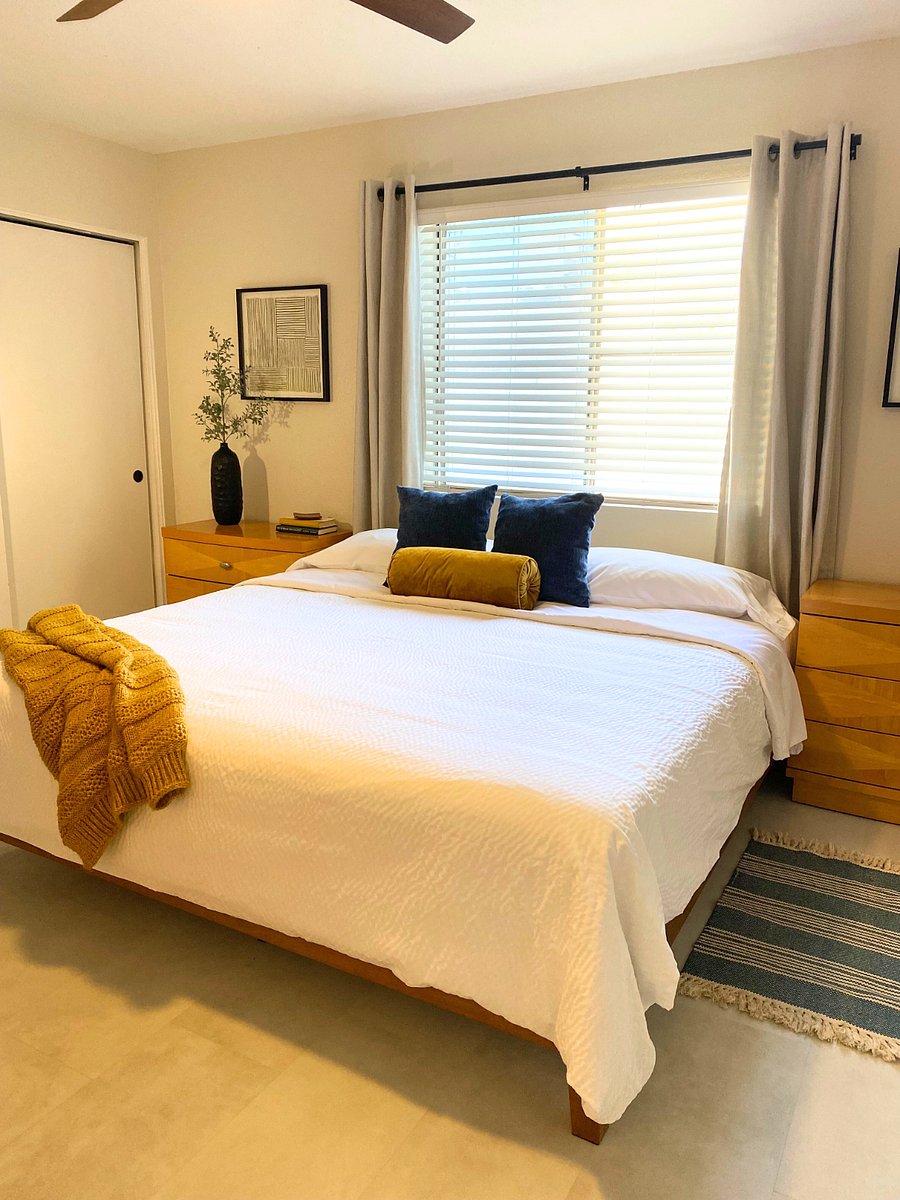 Spacious master bedroom with King size bed and private walk-in shower.