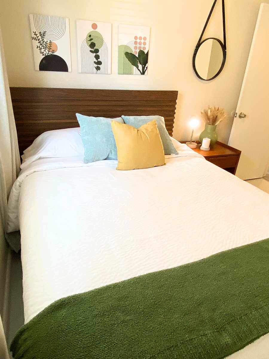 Bedroom 3 w/ nightstand & lamp. Dresser is located inside the closet.