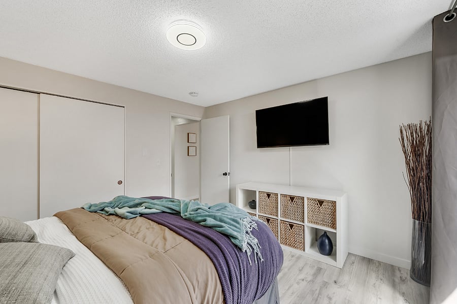Primary bedroom with smart TV