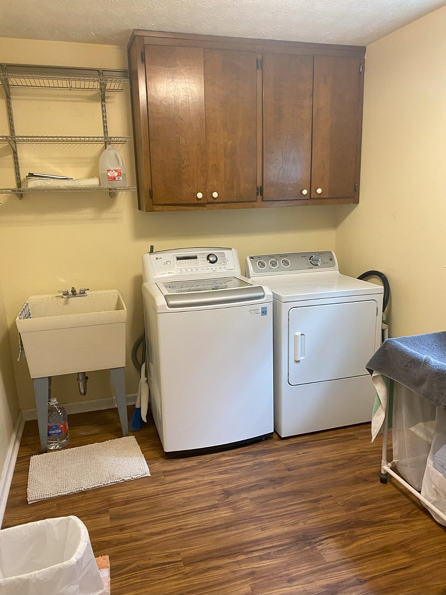 On-site laundry room next to kitchen.
