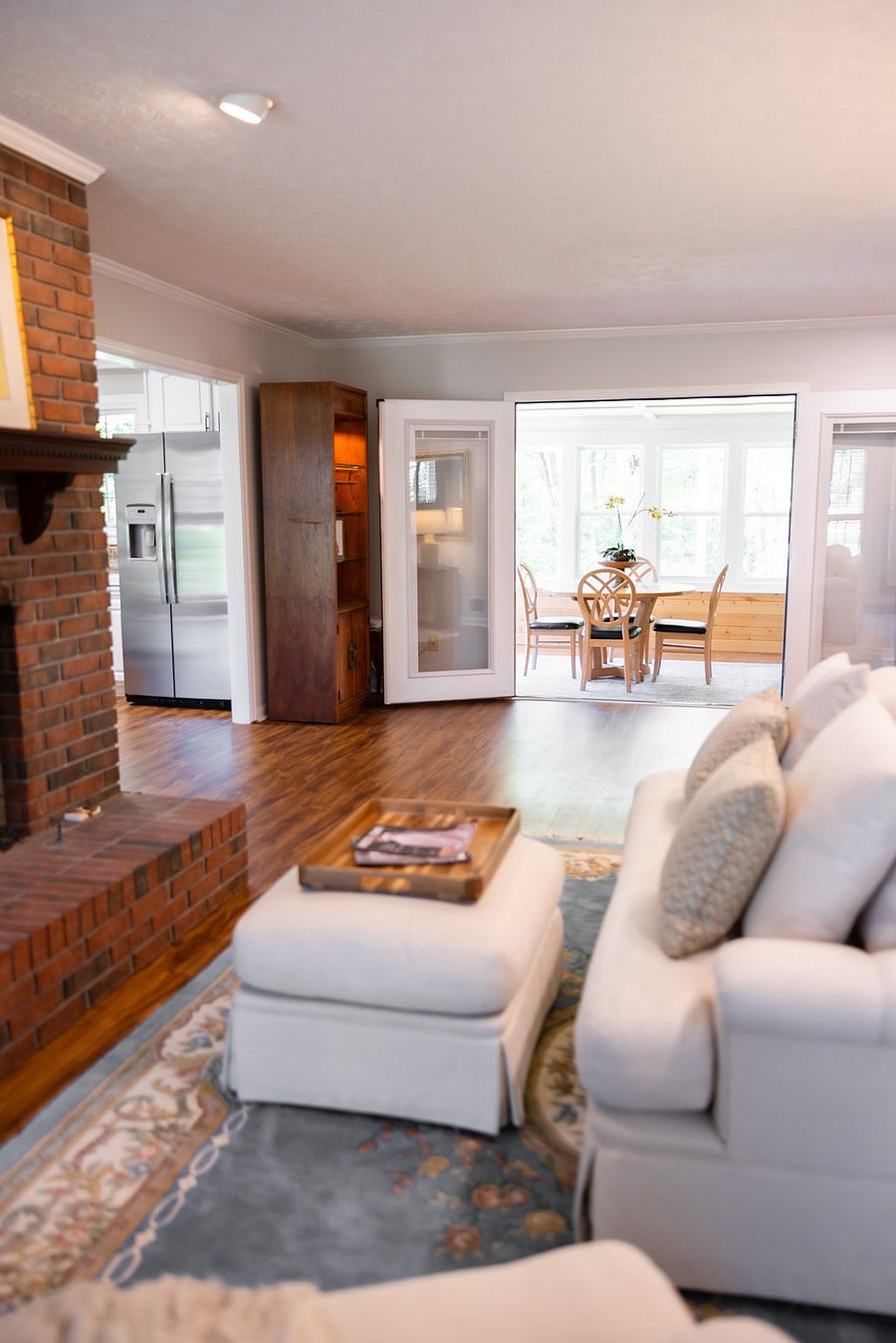 Living room with view of sun room