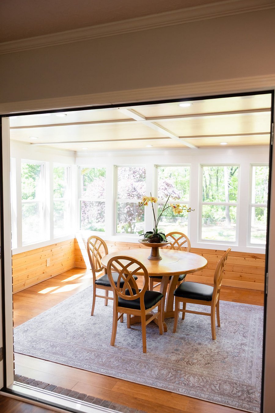 Sun room looking onto backyard