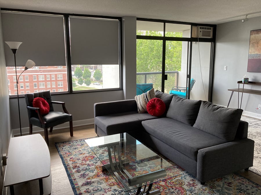 Open living/dining area with computer desk