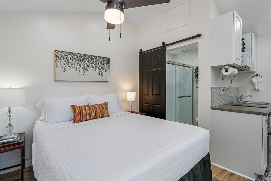 The barn door gives you privacy in the bathroom while also saving space.