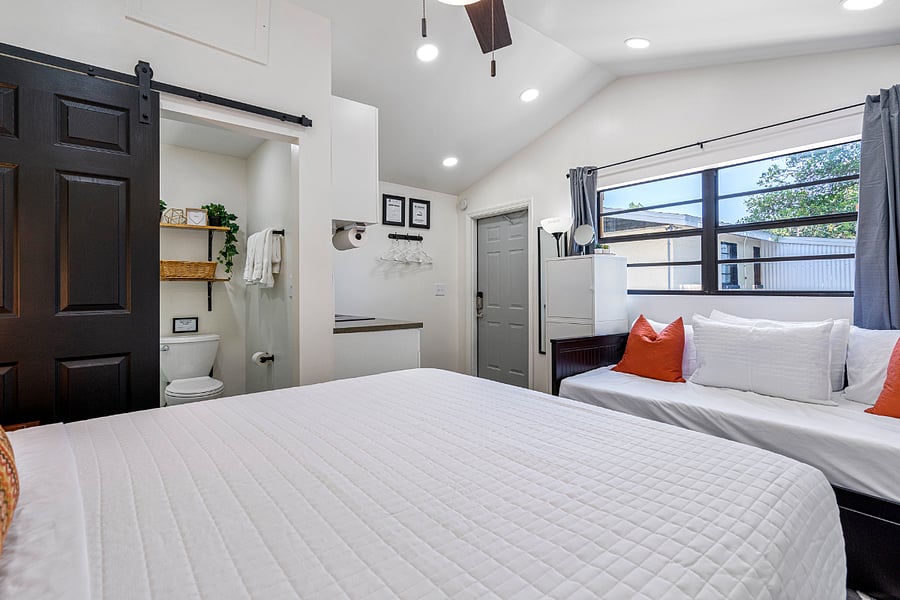Another view of the tiny home, including the large window that lets in lots of natural light.