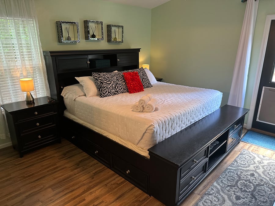 Spacious and comfy king sized bed in primary suite