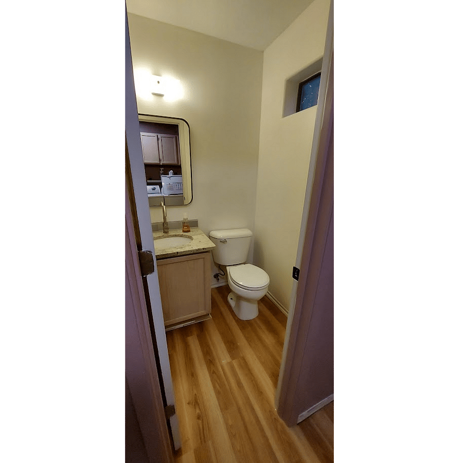 Parlor bathroom through the laundry room immediately to your right when you enter the unit.