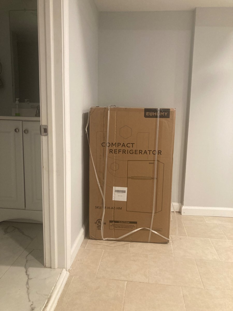 Equipped with a brand new fridge.