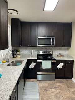 Full size kitchen includes all baking, cooking, utensils, plate ware, and glassware. Keurig coffee including mister coffee, microwave and stove