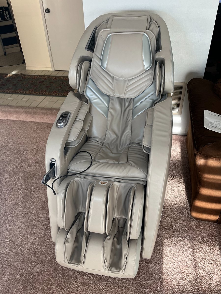 Osaki 3D Massage chair in the living room. Its not uncommon for someone to fall asleep in this thing from time to time. 