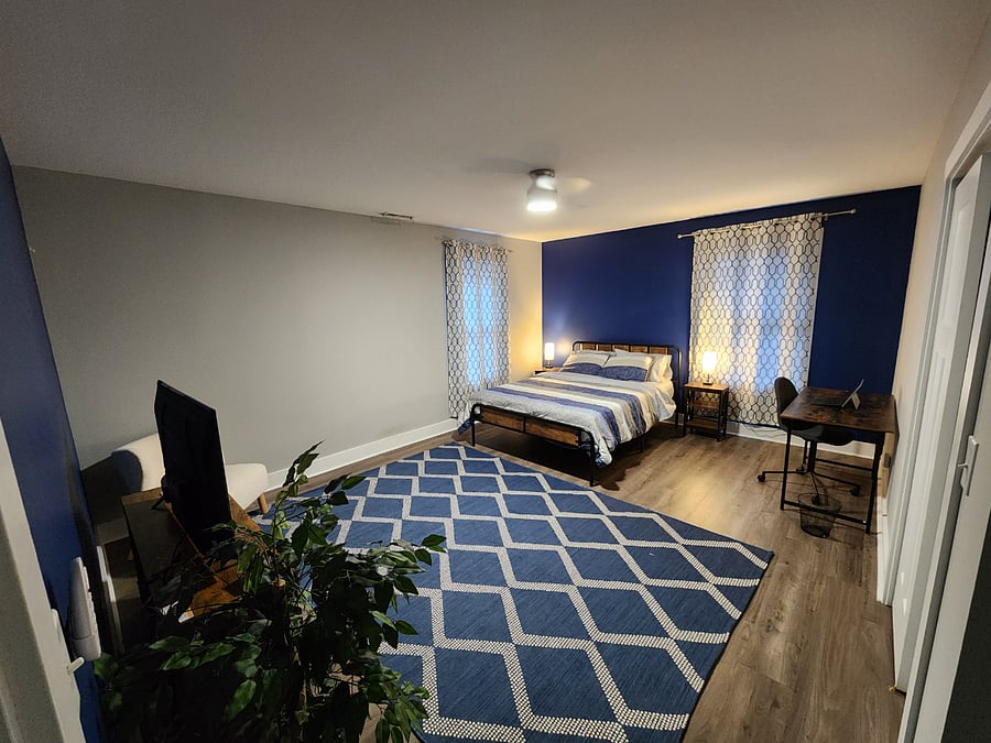 The Ocean Room is upstairs. Lots of natural light and shares a full bathroom with double sinks.